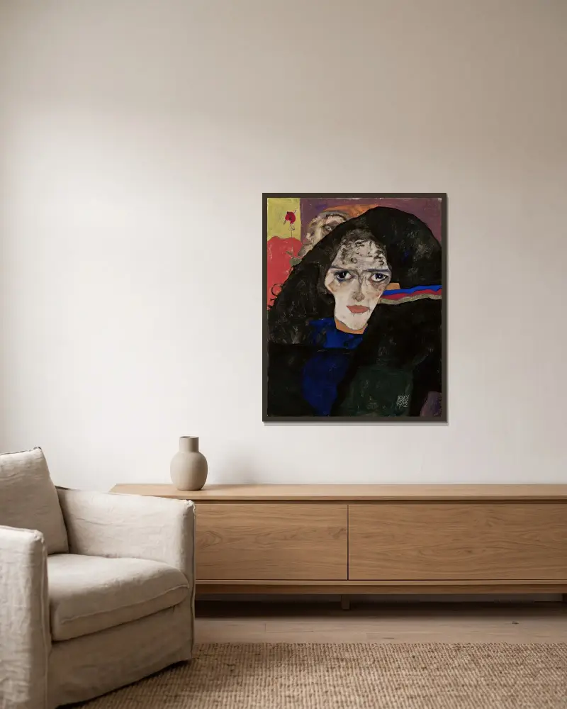 Mourning Woman av Egon Schiele inramad på en vägg
