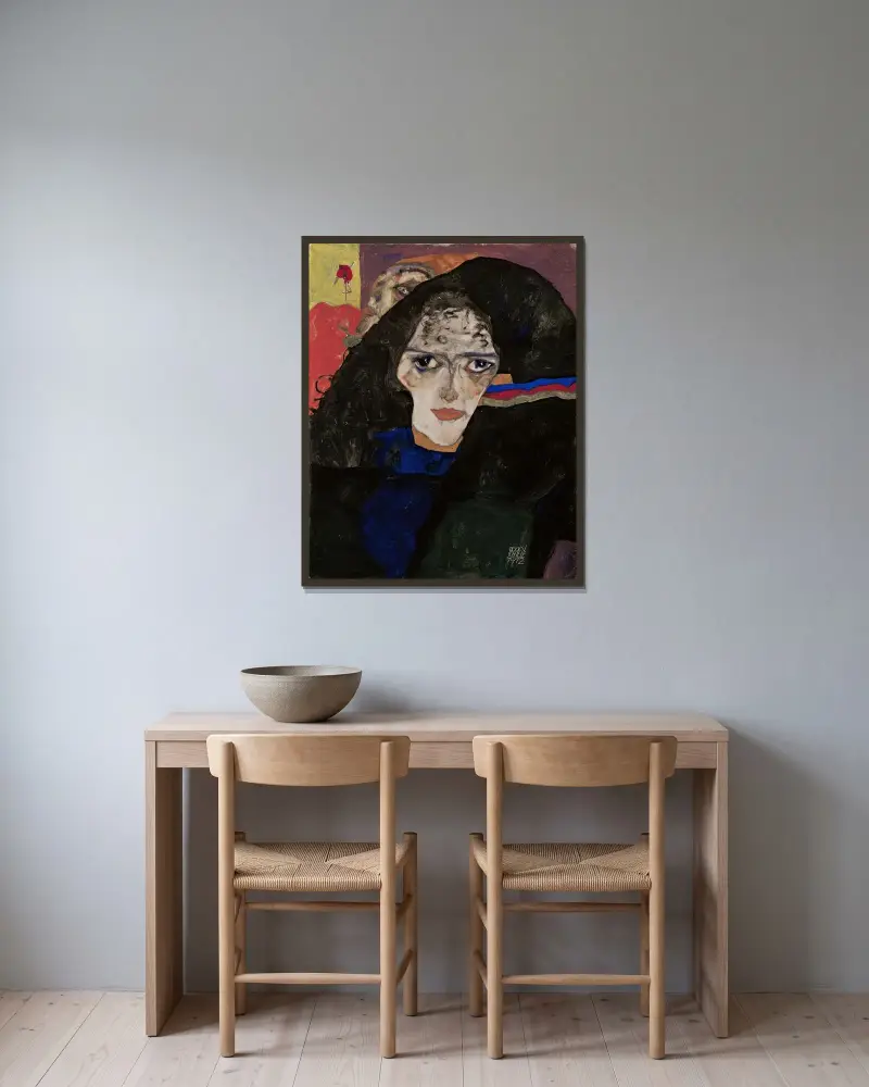 Mourning Woman av Egon Schiele inramad på en vägg
