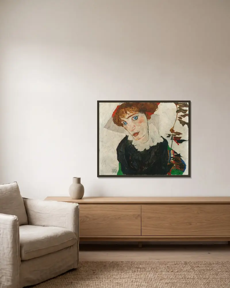 Porträtt av Wally Neuzil av Egon Schiele inramad på en vägg
