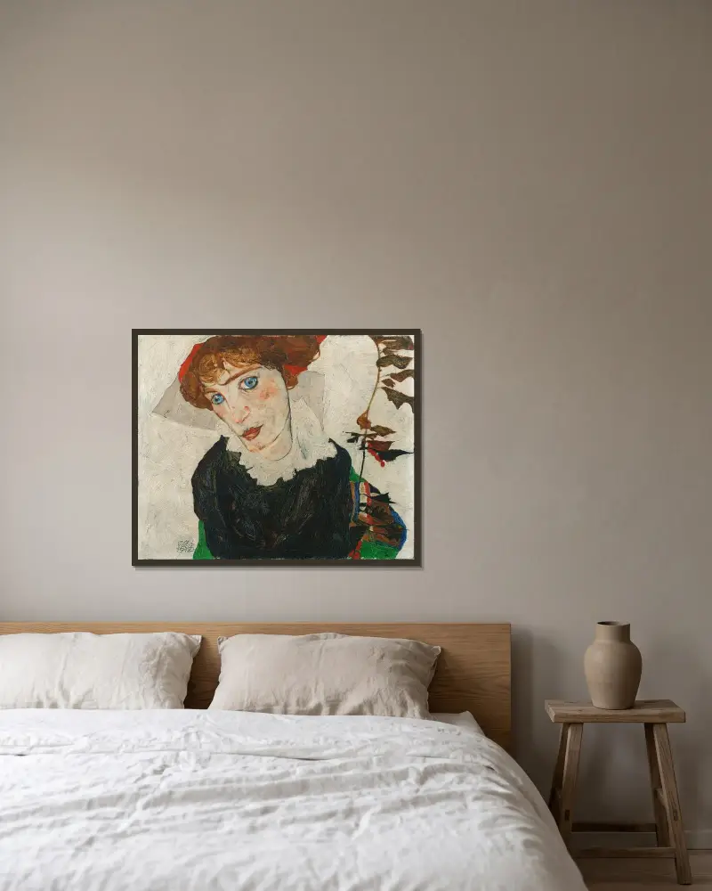 Porträtt av Wally Neuzil av Egon Schiele inramad på en vägg