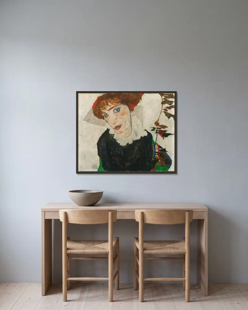 Porträtt av Wally Neuzil av Egon Schiele inramad på en vägg