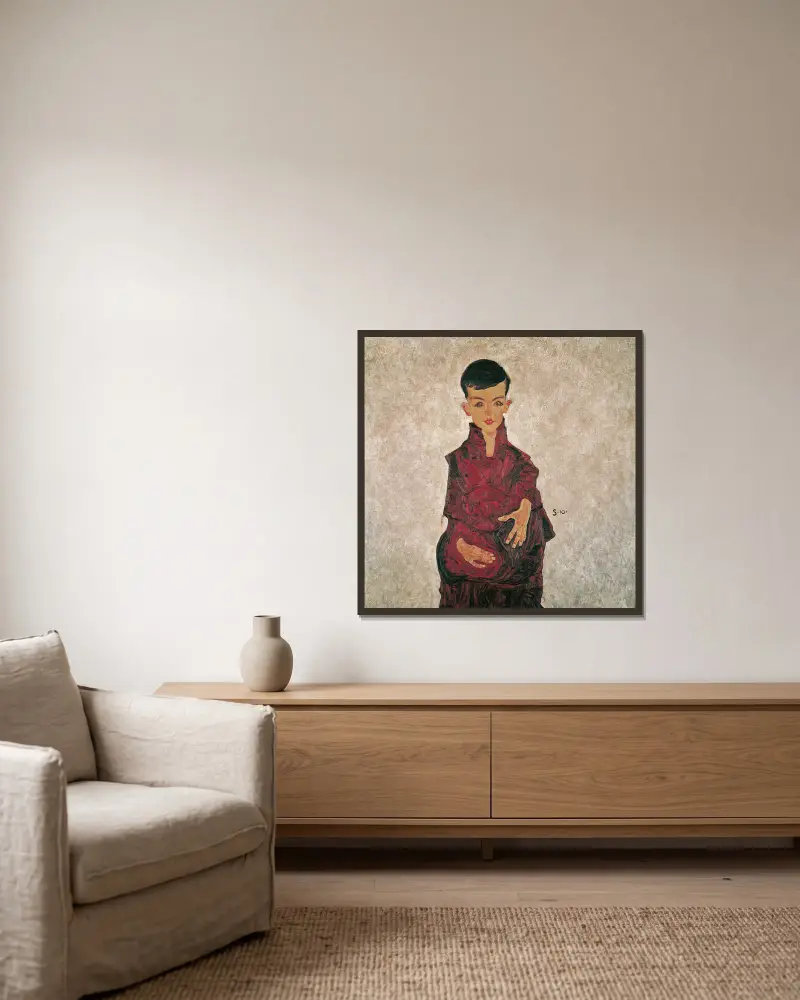 Reinerbub (Bildnis Herbert Reiner) von Egon Schiele gerahmt an einer Wand