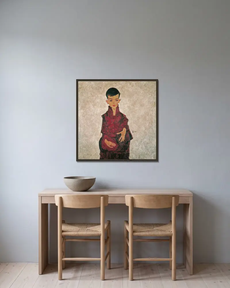 Reinerbub (Bildnis Herbert Reiner) von Egon Schiele gerahmt an einer Wand