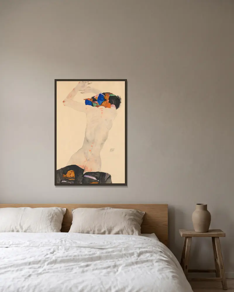 Ryggakt med färgglatt tyg av Egon Schiele inramad på en vägg