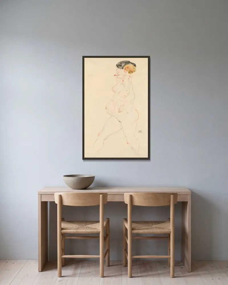 Gravid kvinna med barn i famnen av Egon Schiele inramad på en vägg