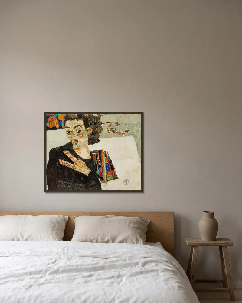 Selbstbildnis av Egon Schiele inramad på en vägg