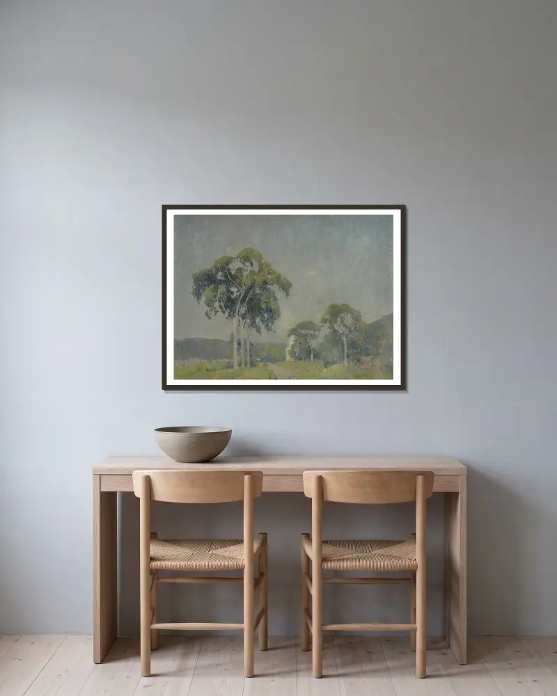 Landscape with Trees av Emil Carlsen inramad på en vägg