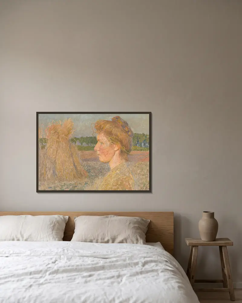 Profil av en kvinna och vetekärvar av Emile Claus inramad på en vägg