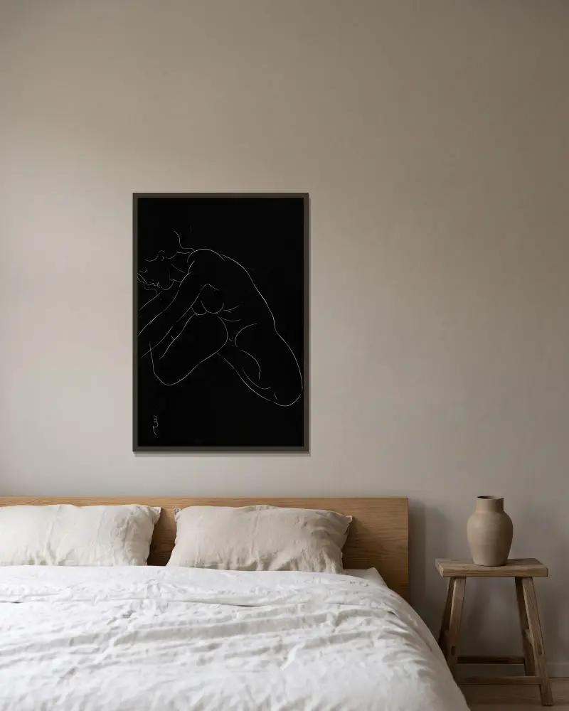 Twenty-five nudes Pl 11 av Eric Gill inramad på en vägg