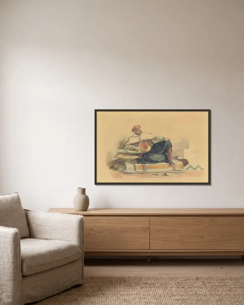 Ein Berber auf einer niedrigen Couch sitzend von Eugène Delacroix gerahmt an einer Wand