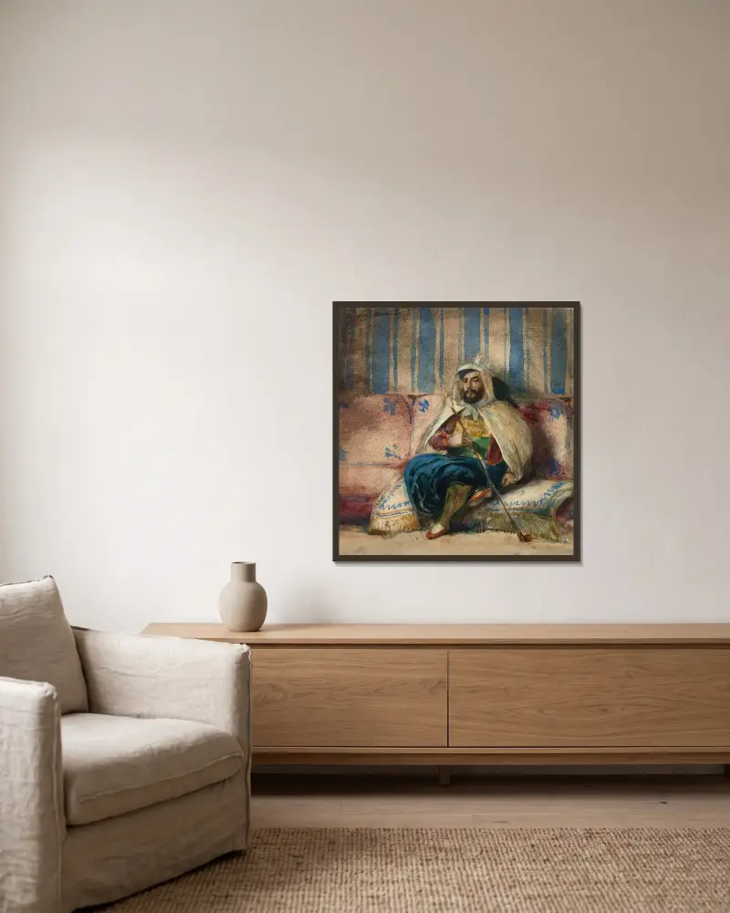 Man i orientalisk dräkt som röker på en soffa av Eugène Delacroix inramad på en vägg