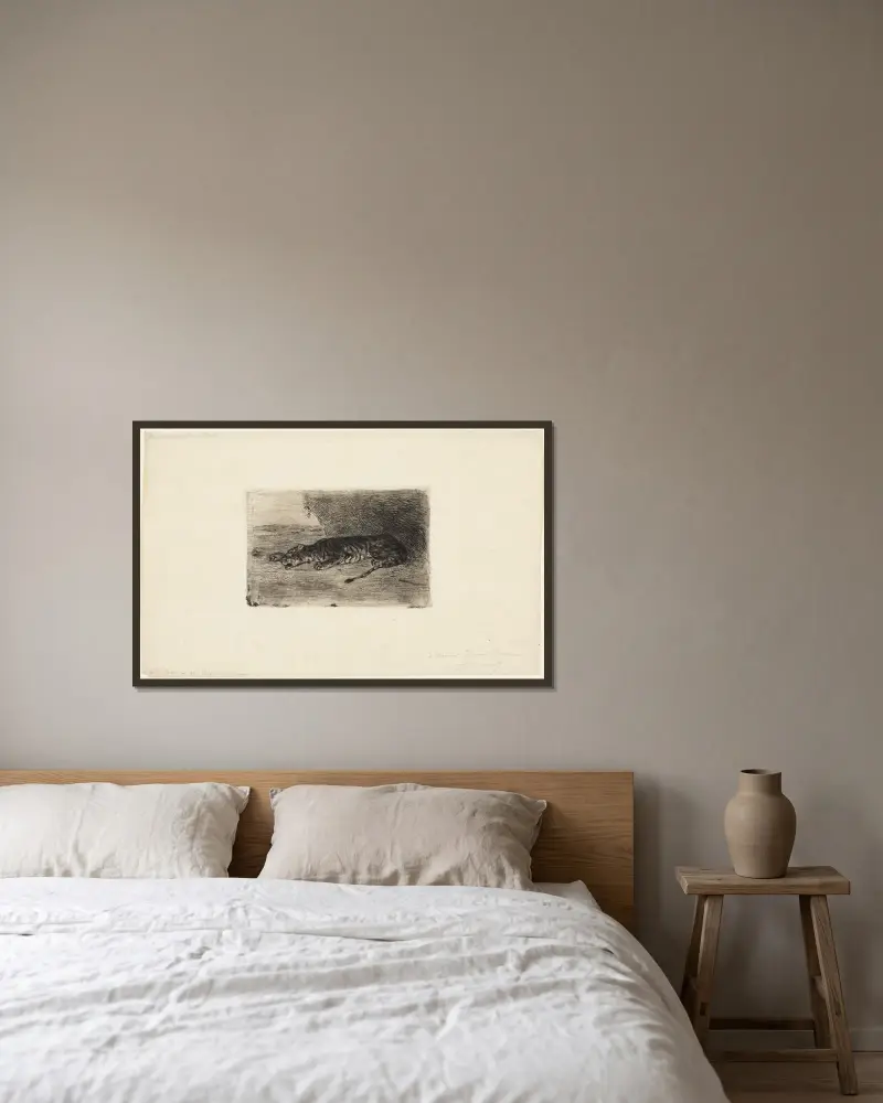 Liegender Tiger am Eingang seiner Höhle von Eugène Delacroix gerahmt an einer Wand