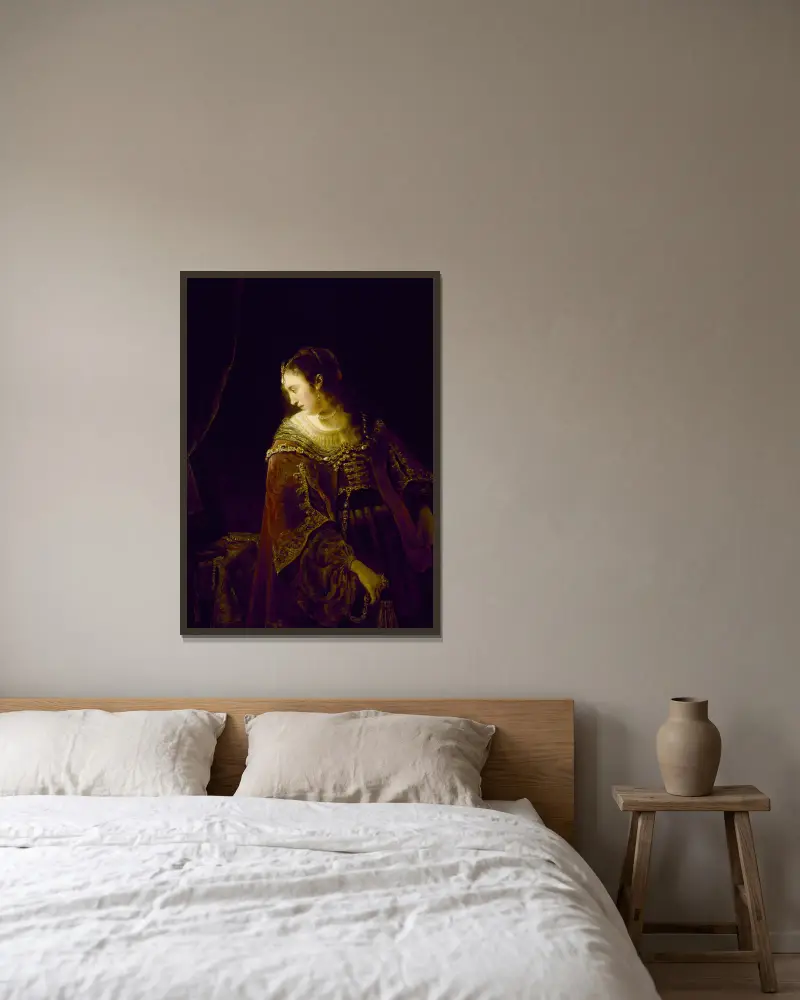 Frau am Frisiertisch von Ferdinand Bol gerahmt an einer Wand