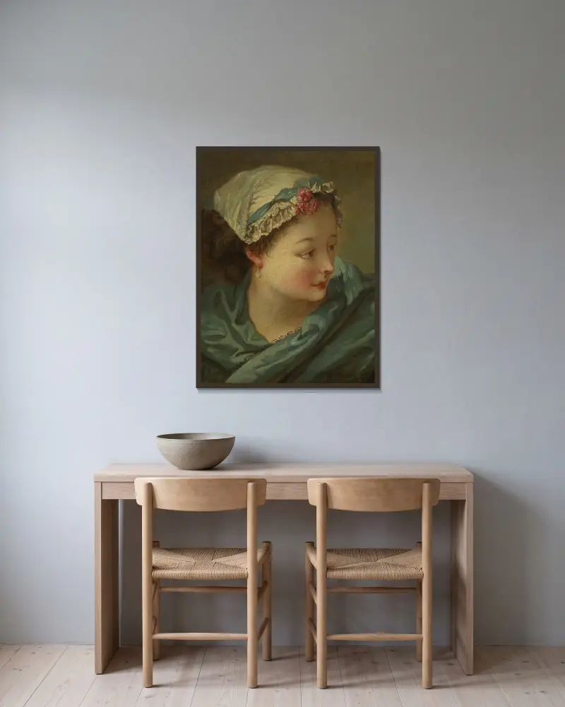 Kopf einer jungen Frau von François Boucher gerahmt an einer Wand