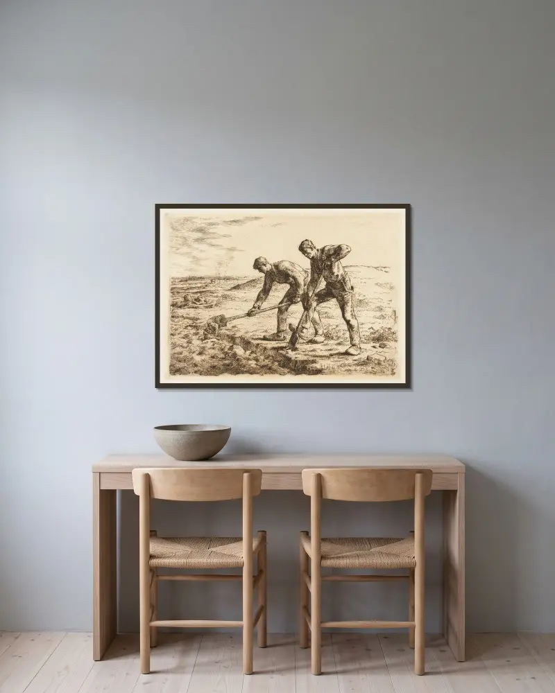 Les Bêcheurs av Jean-François Millet inramad på en vägg
