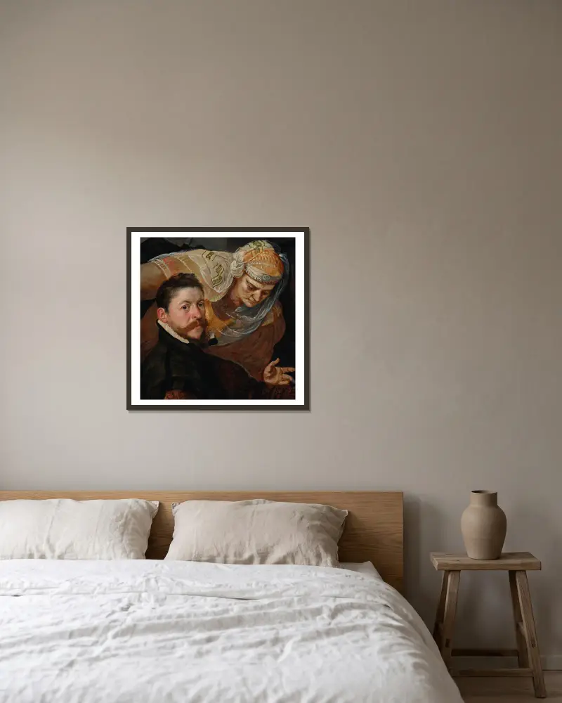 Porträtt av en konstnär, sittande, med en kvinna lutad över hans axel av Frans Floris inramad på en vägg