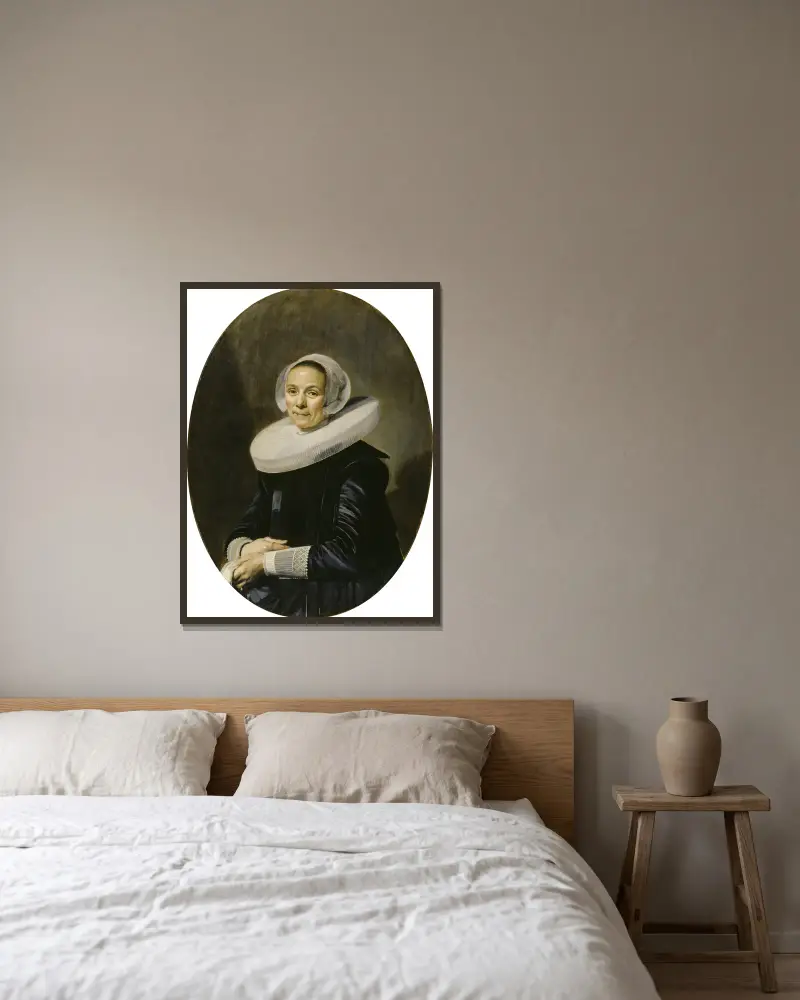 Bildnis einer Frau, 1638 von Frans Hals gerahmt an einer Wand