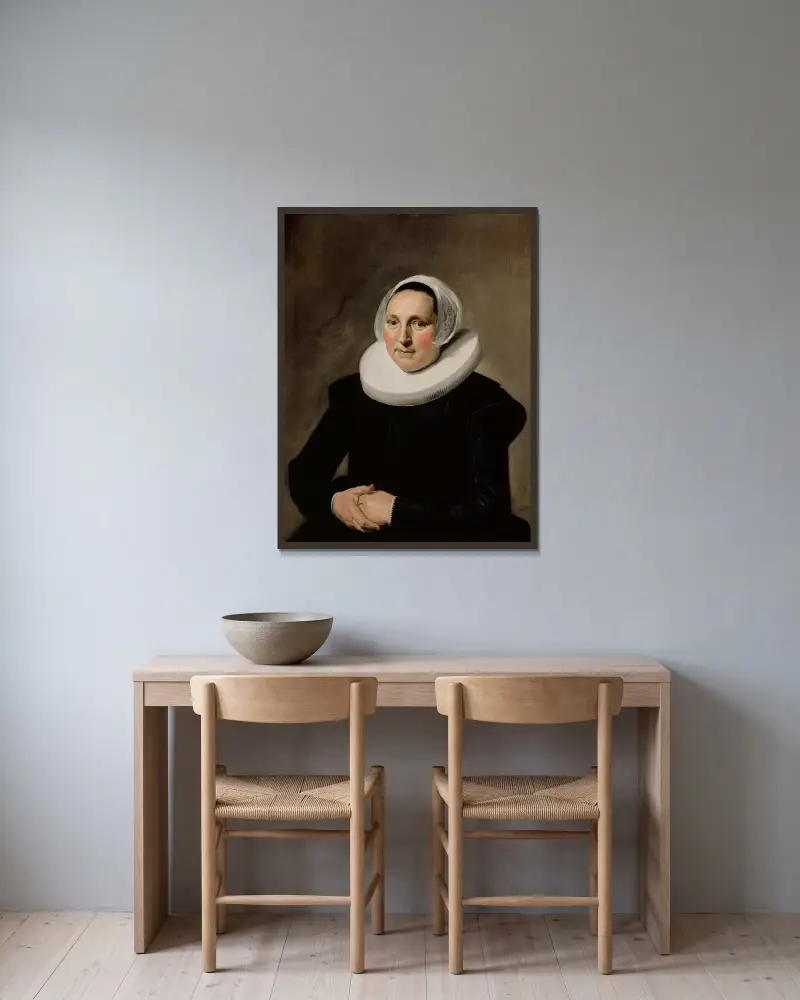 Bildnis einer Frau, 1634 von Frans Hals gerahmt an einer Wand