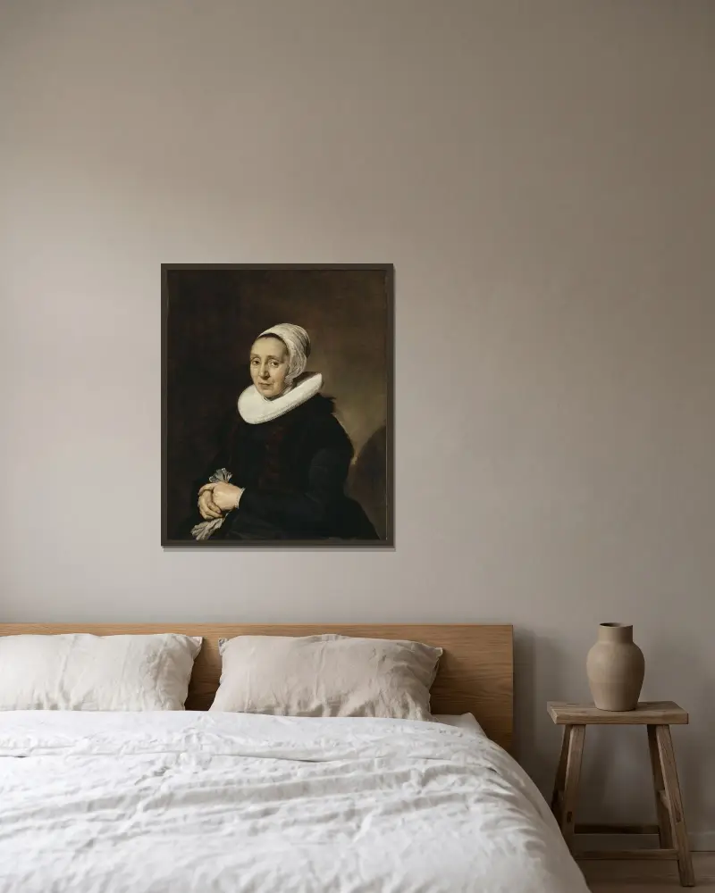 Porträtt av en kvinna, 1643 av Frans Hals inramad på en vägg