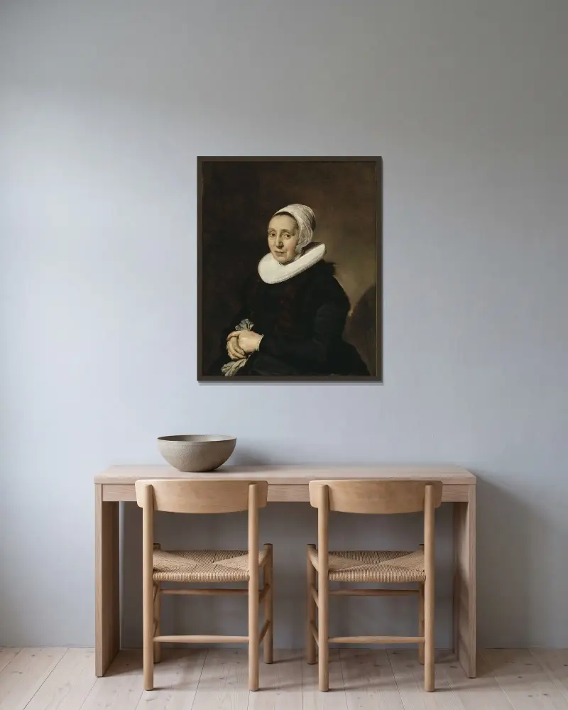 Porträtt av en kvinna, 1643 av Frans Hals inramad på en vägg