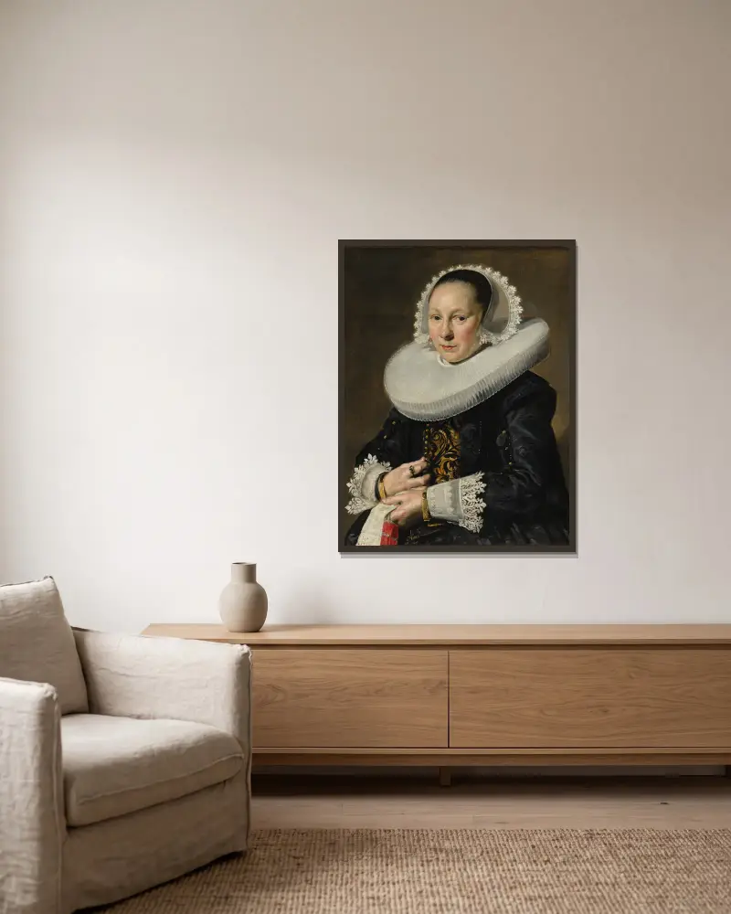 Porträtt av en kvinna, troligen Aeltje Dircksdr. Pater av Frans Hals inramad på en vägg