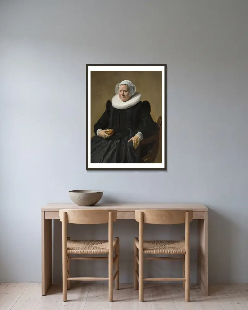 Bildnis einer älteren Dame von Frans Hals gerahmt an einer Wand