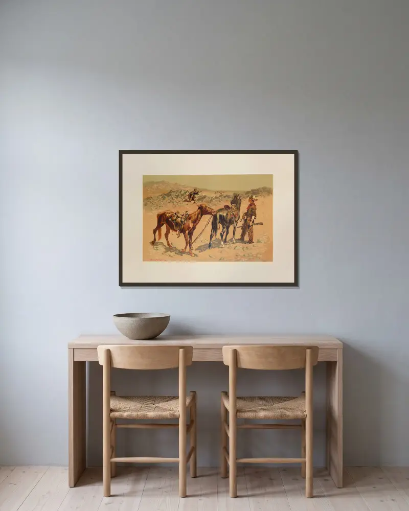 Hunting Antelope av Frederic Remington inramad på en vägg