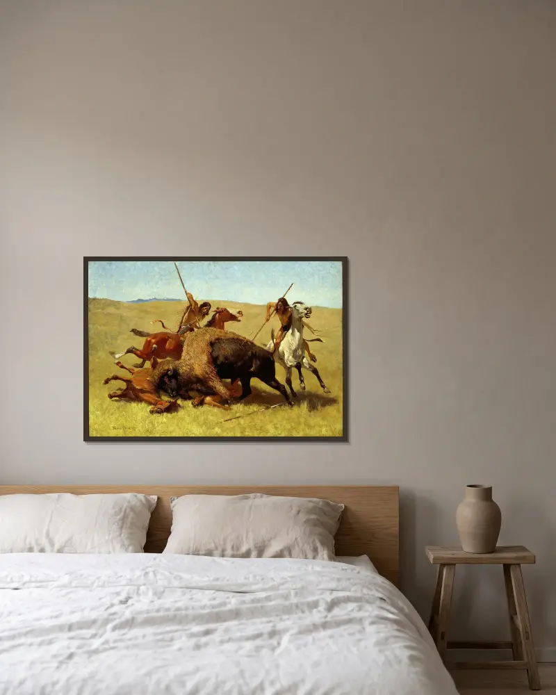 Die Büffeljagd von Frederic Remington gerahmt an einer Wand