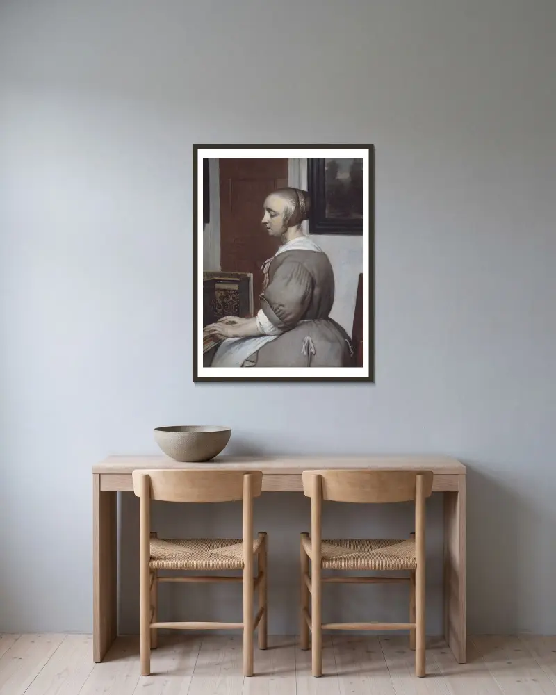 Femme au virginal av Gabriel Metsu inramad på en vägg