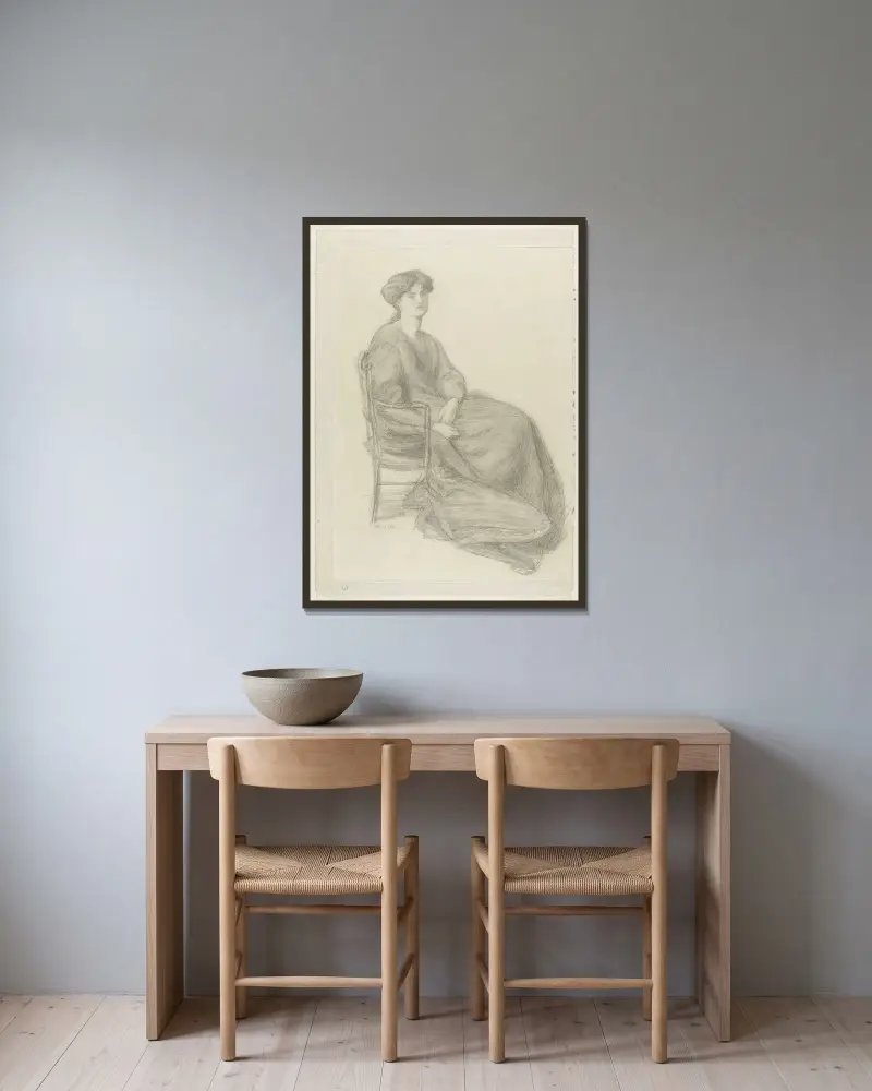 Mrs William Morris sittande i stol av Dante Gabriel Rossetti inramad på en vägg