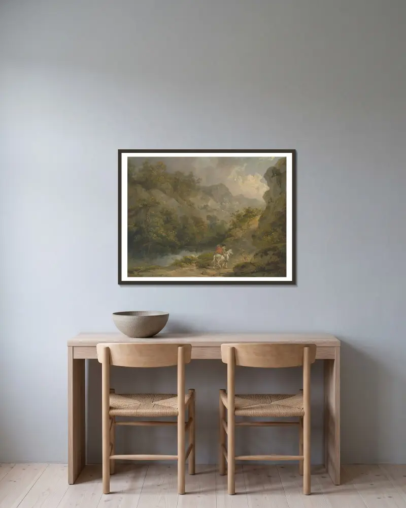 Kuperat landskap med två män på en häst av George Morland inramad på en vägg