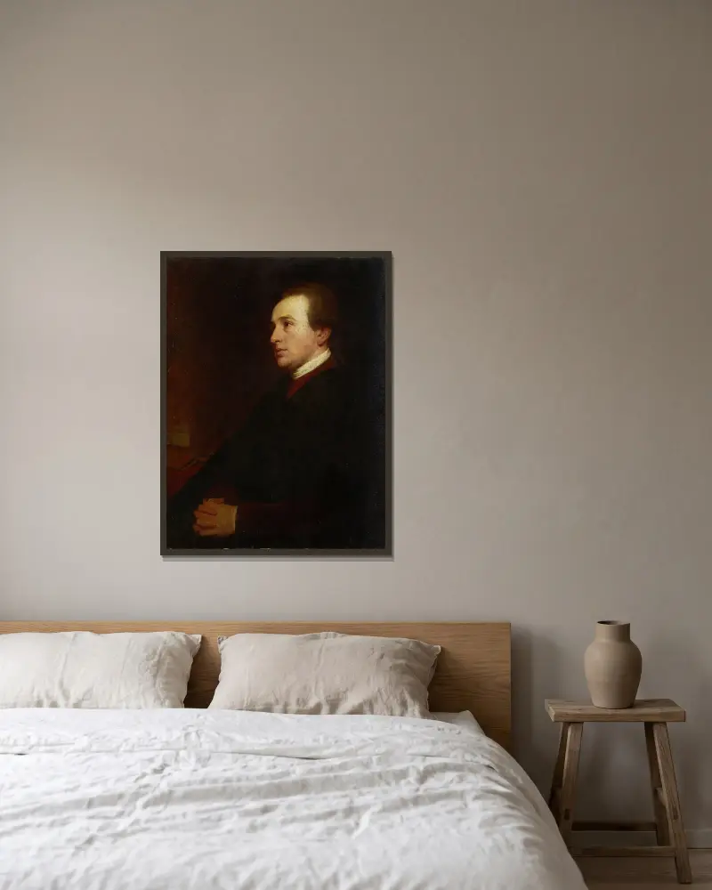 Porträtt av en ung man vid sitt skrivbord av George Romney inramad på en vägg