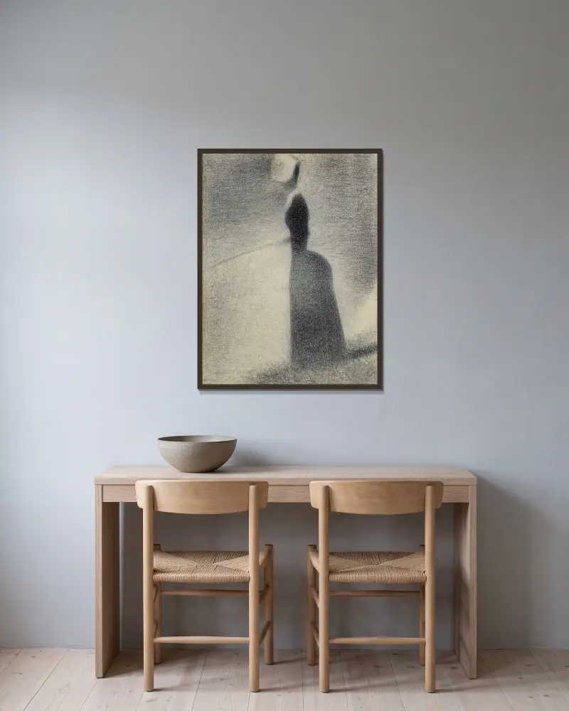 En kvinna som fiskar av Georges Seurat inramad på en vägg