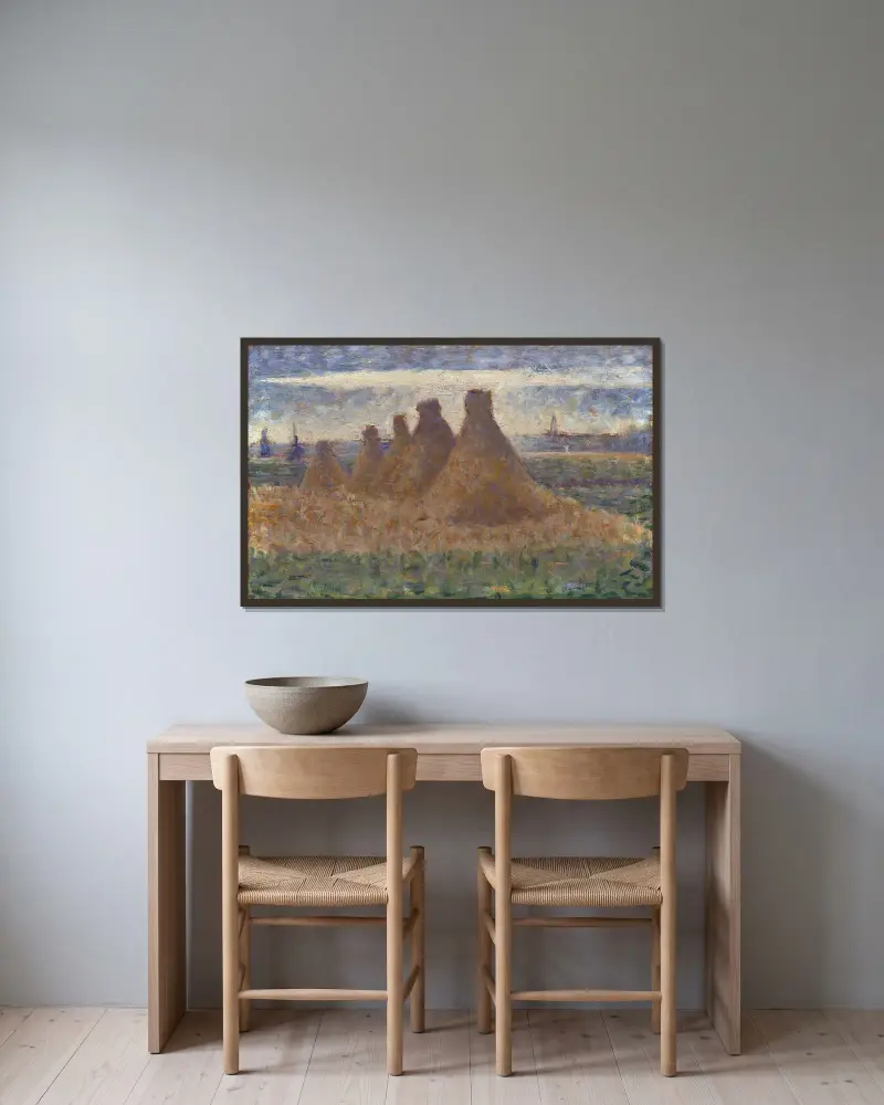 Haystacks av Georges Seurat inramad på en vägg