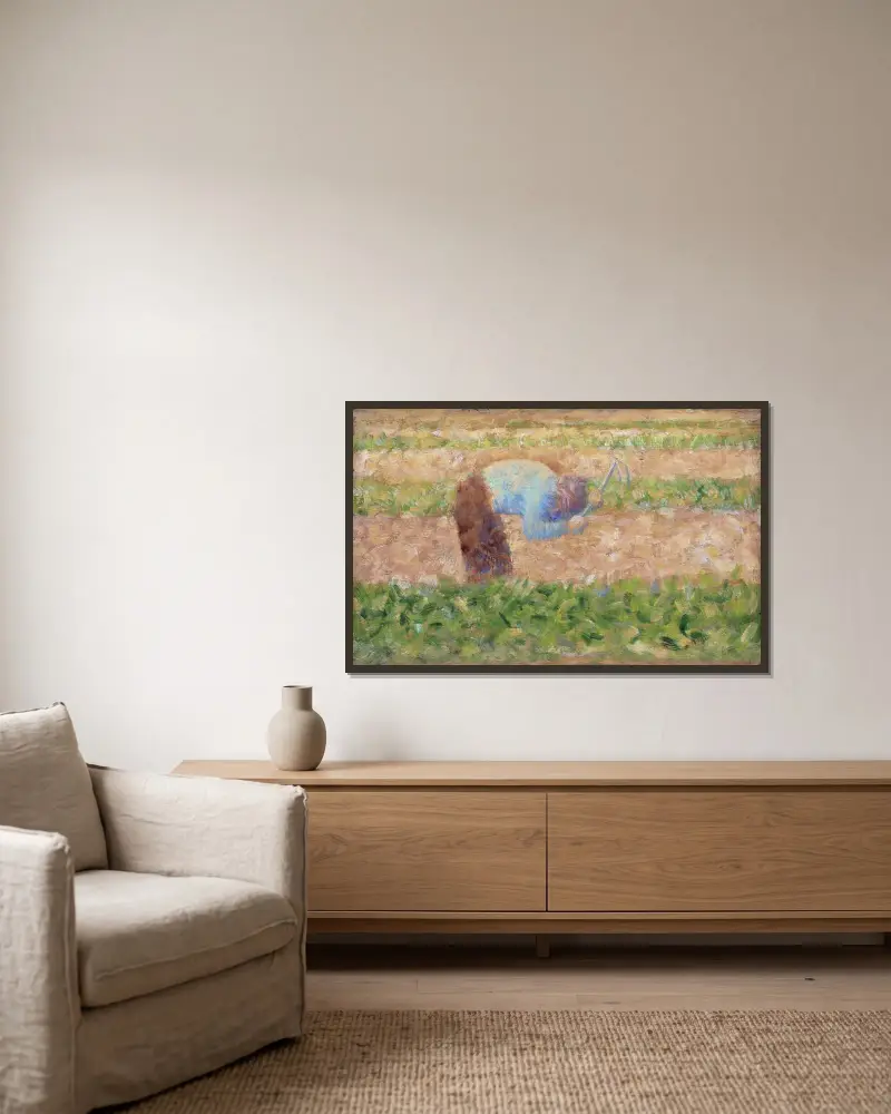 Man with a Hoe av Georges Seurat inramad på en vägg