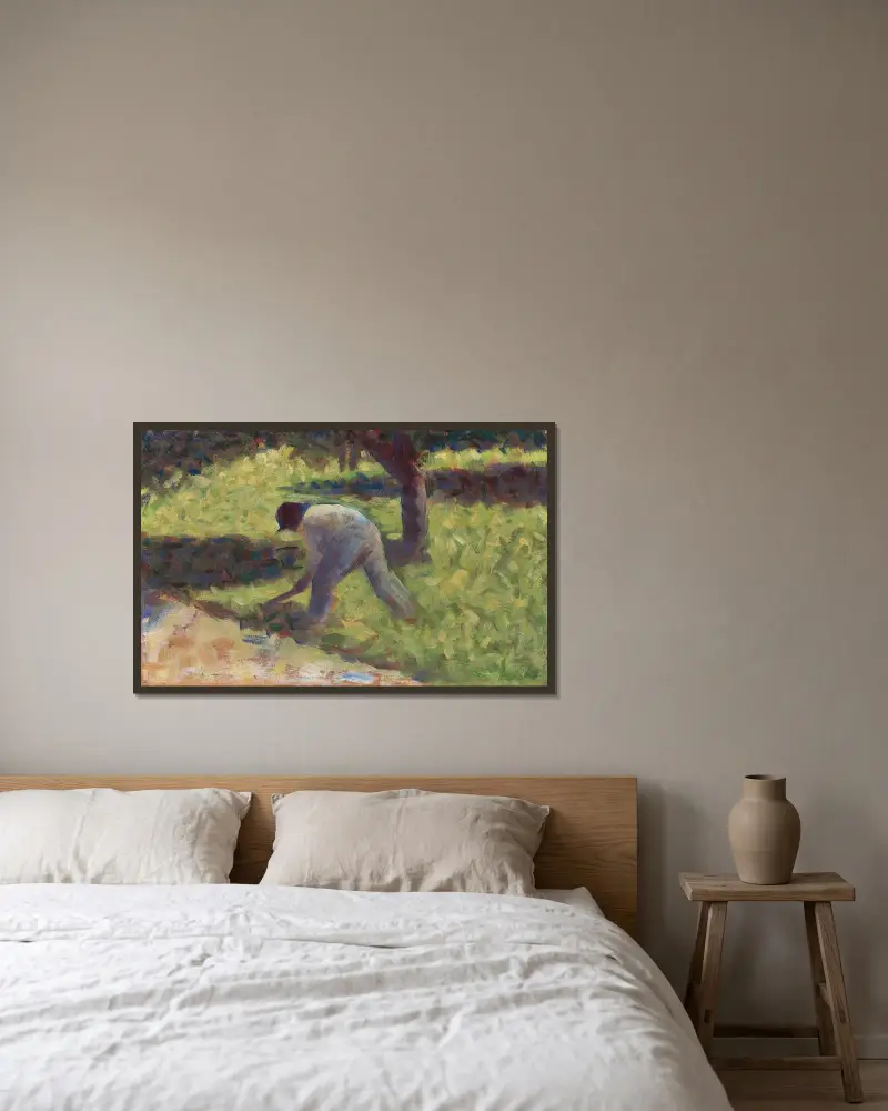 Peasant with a Hoe av Georges Seurat inramad på en vägg