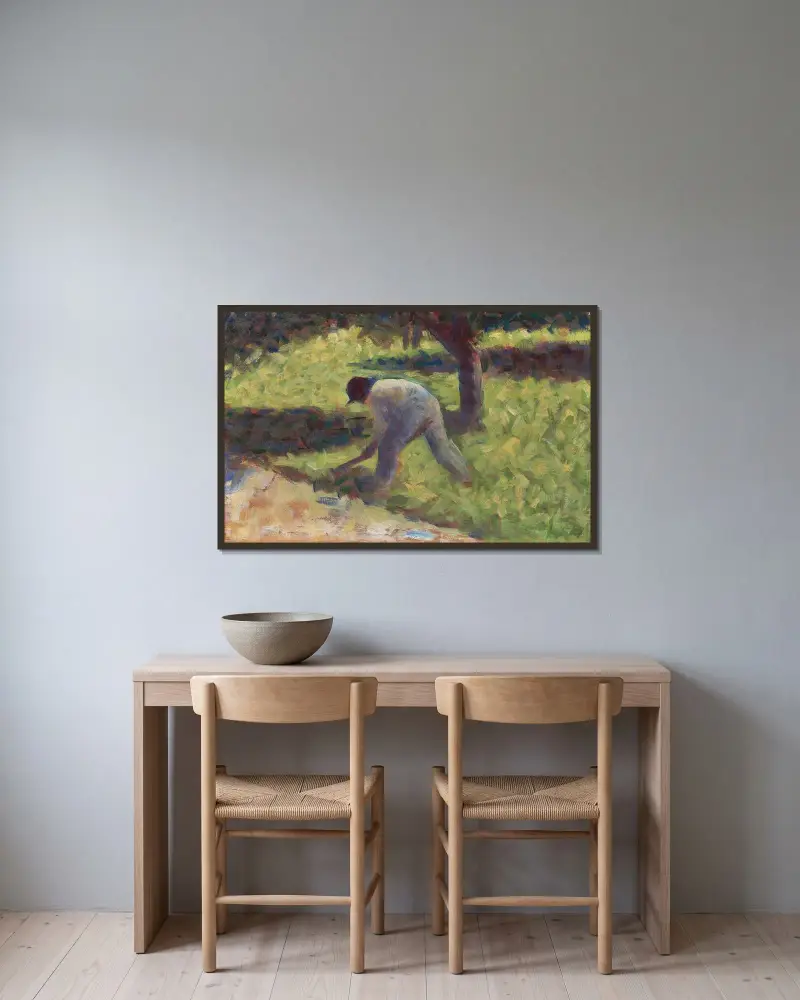 Peasant with a Hoe av Georges Seurat inramad på en vägg