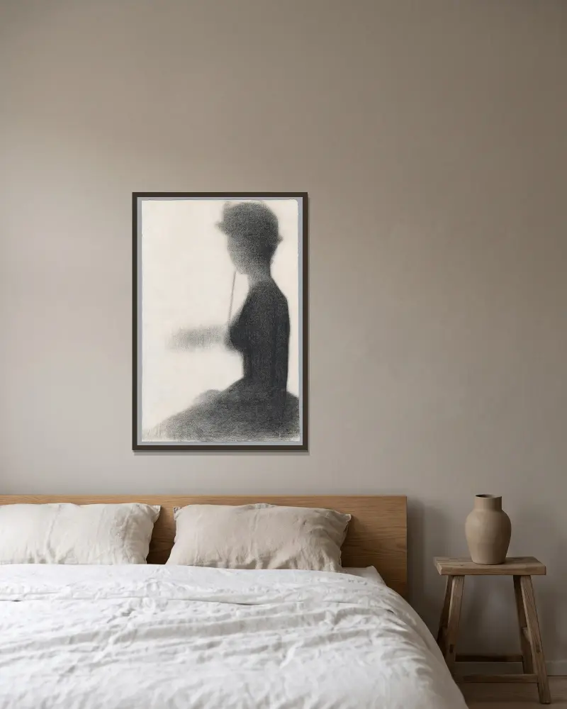 Sitzende Frau mit Sonnenschirm von Georges Seurat gerahmt an einer Wand