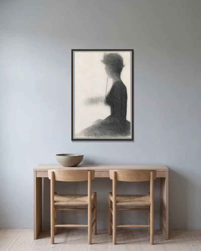 Sitzende Frau mit Sonnenschirm von Georges Seurat gerahmt an einer Wand