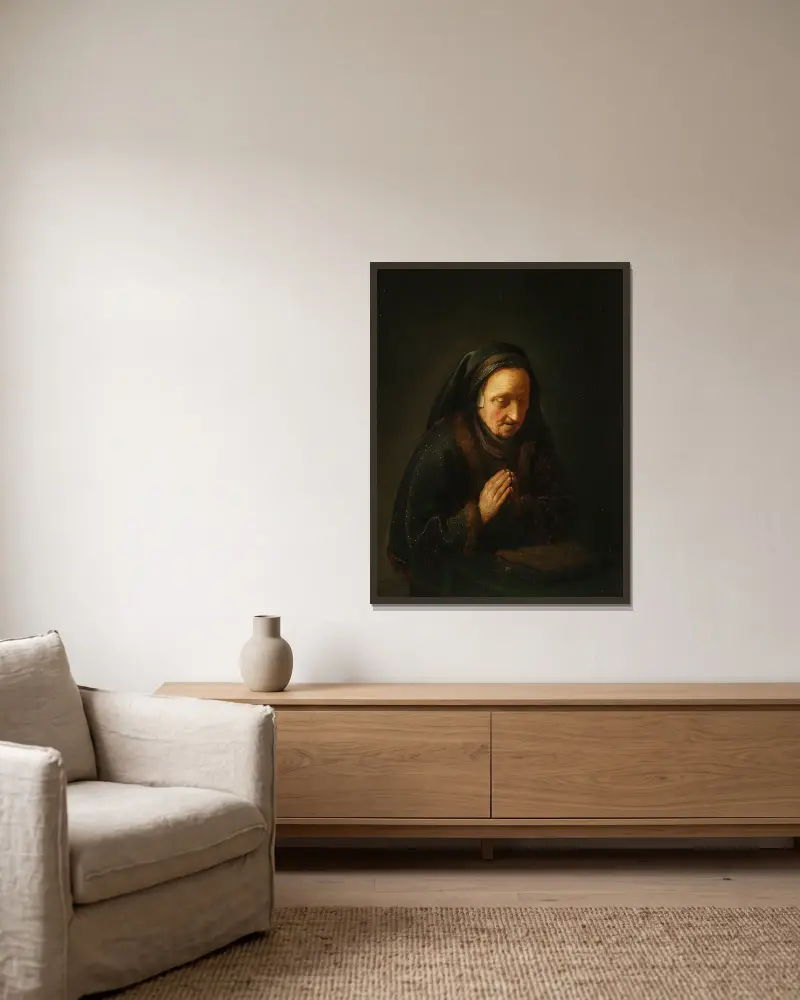 Praying old woman av Gerrit Dou inramad på en vägg