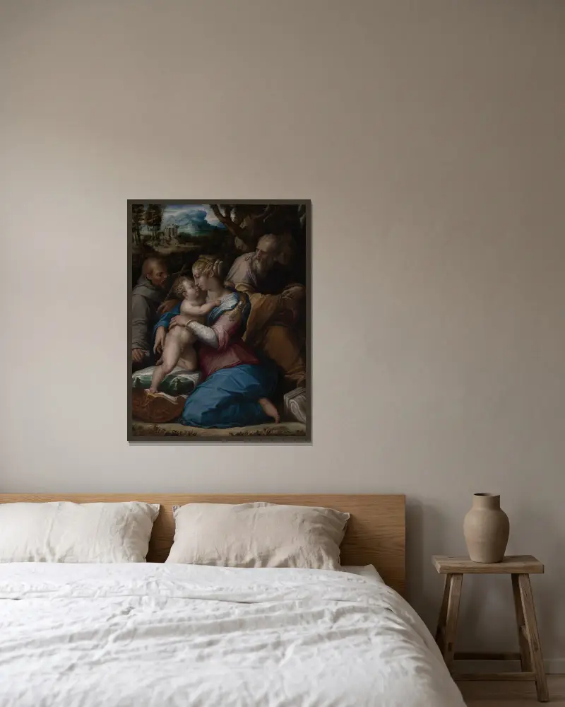 Den heliga familjen med Franciskus av Giorgio Vasari inramad på en vägg