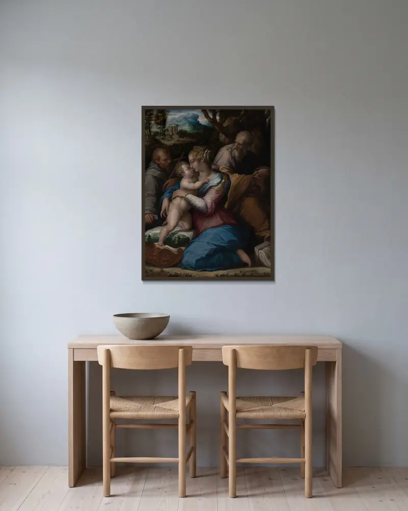 Den heliga familjen med Franciskus av Giorgio Vasari inramad på en vägg