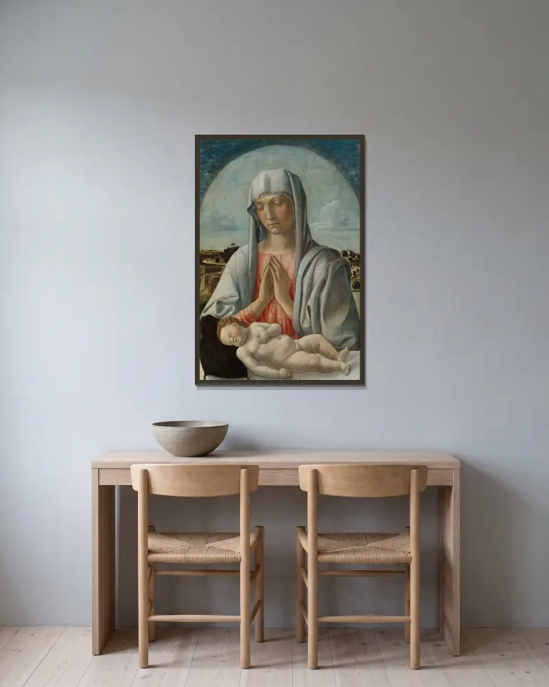 Madonnan som tillber det sovande barnet av Giovanni Bellini inramad på en vägg