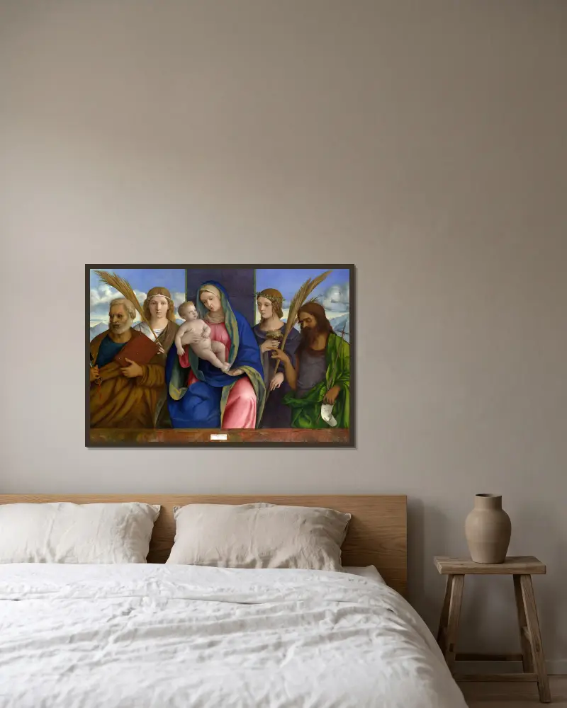 Madonnan med barnet och helgon av Giovanni Bellini inramad på en vägg
