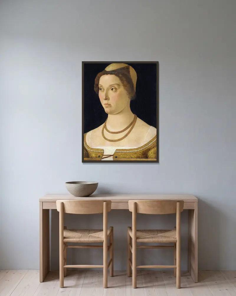 Porträtt av en kvinna av Giovanni Bellini inramad på en vägg