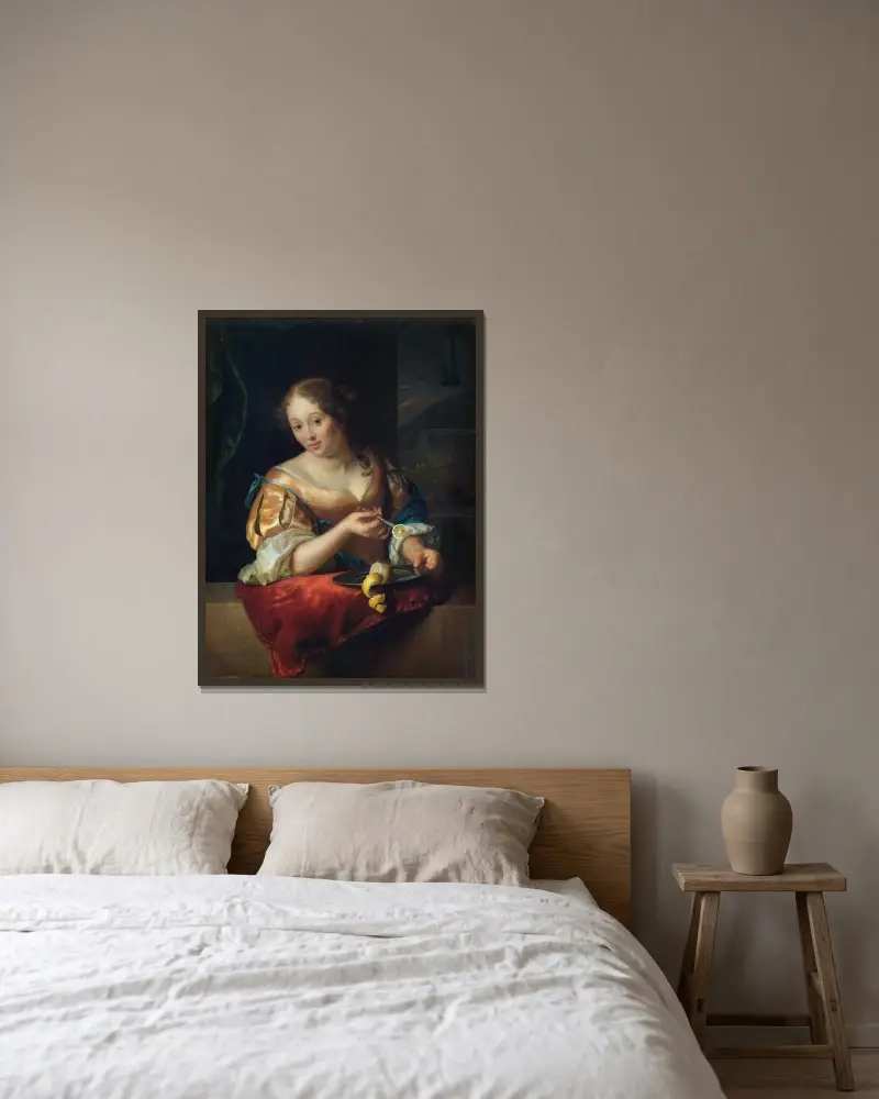 Junge Frau mit Zitrone von Godfried Schalcken gerahmt an einer Wand