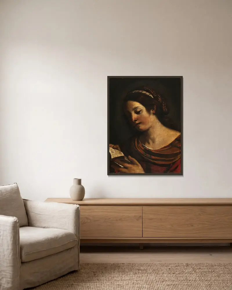 Young Girl Reading av Guercino inramad på en vägg
