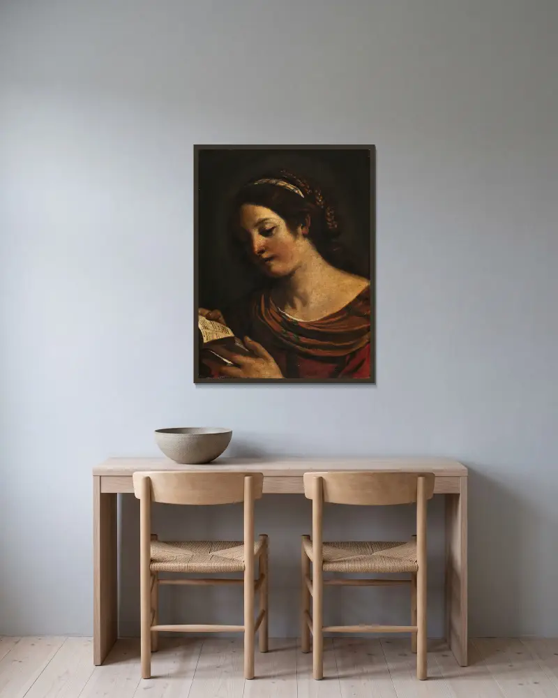 Young Girl Reading av Guercino inramad på en vägg