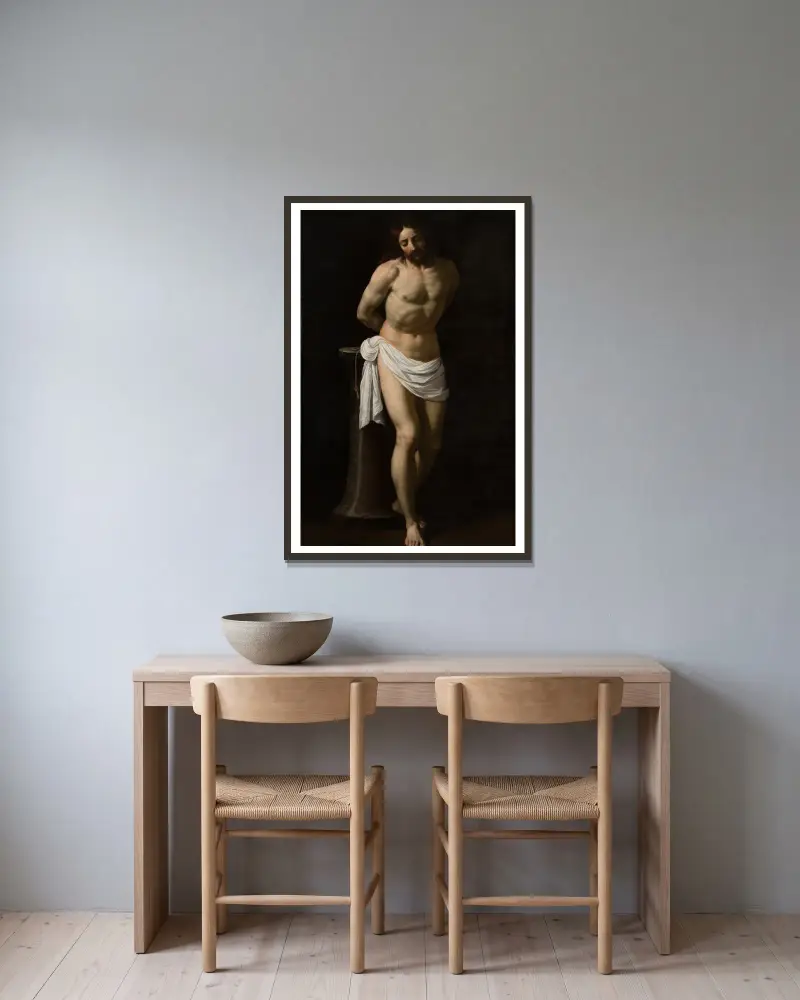 Christ at the Column av Guido Reni inramad på en vägg