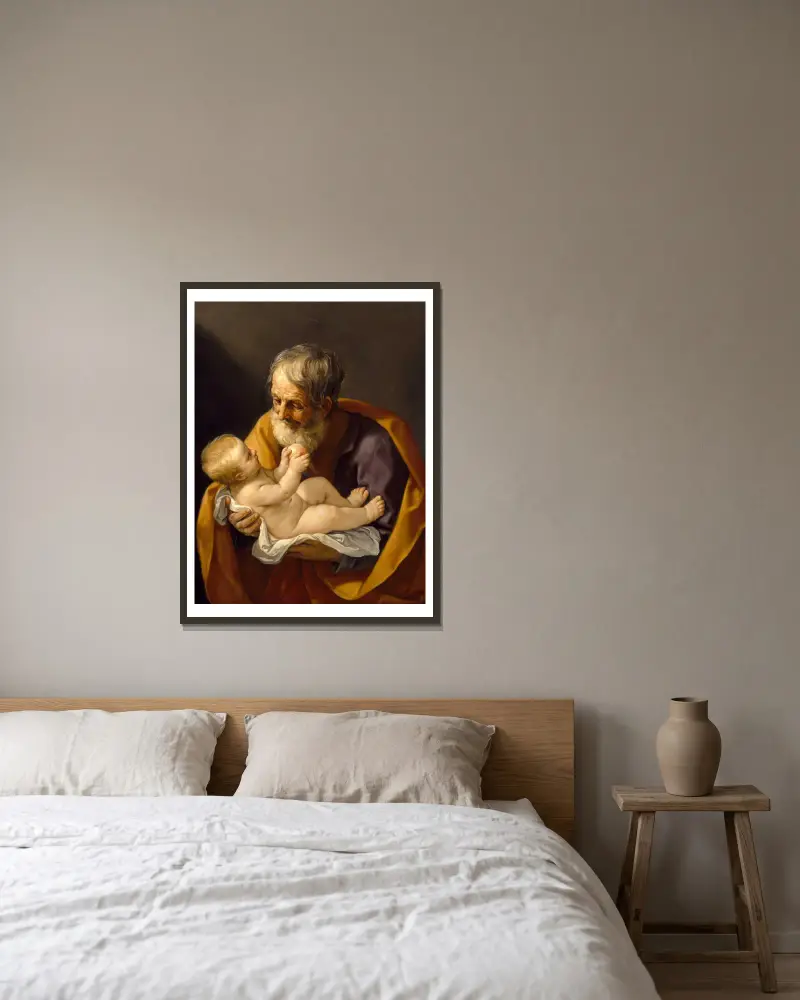 Den helige Josef och Jesusbarnet av Guido Reni inramad på en vägg